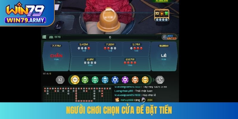 Người chơi chọn cửa để đặt tiền